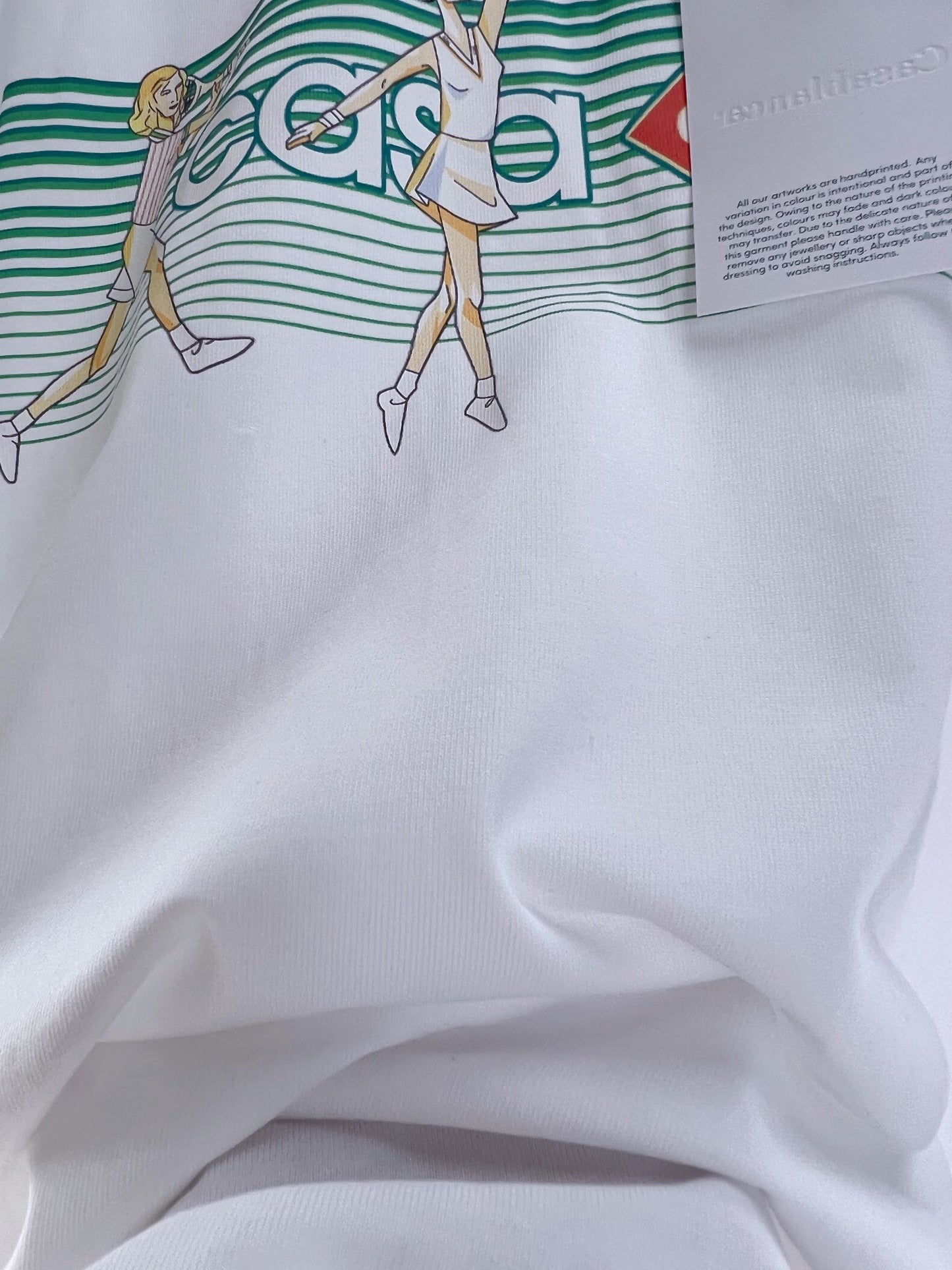 Camiseta azul y blanca