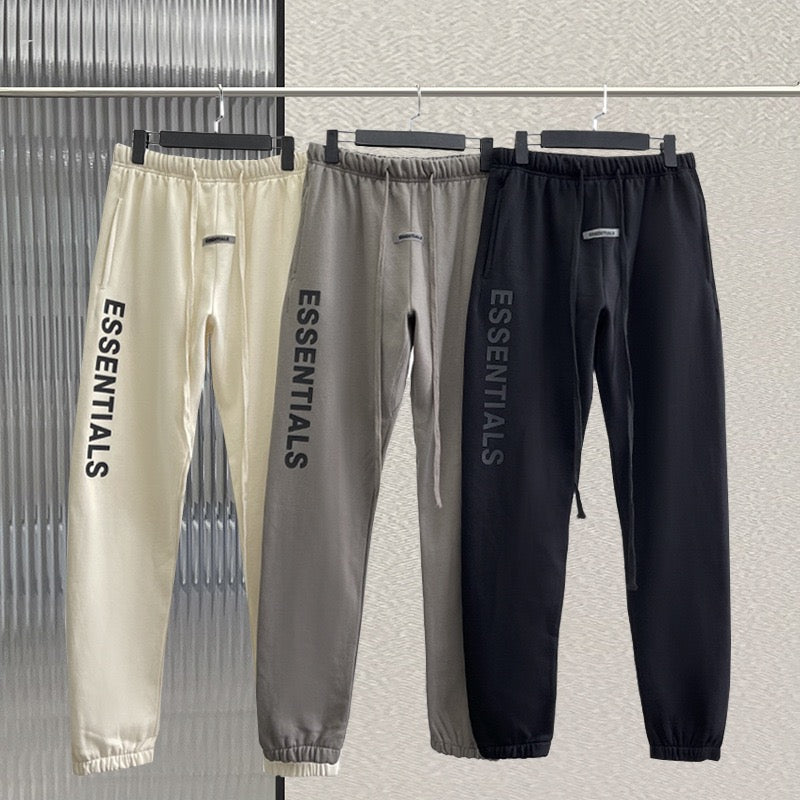 Schwarze, weiße und graue Hose