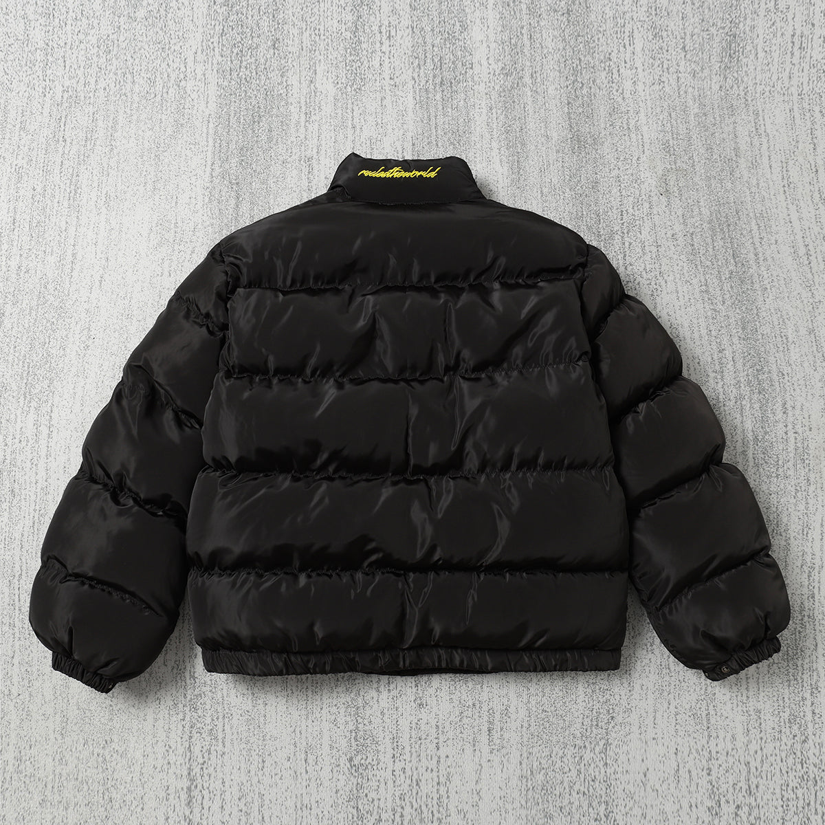 Schwarze und graue Jacke