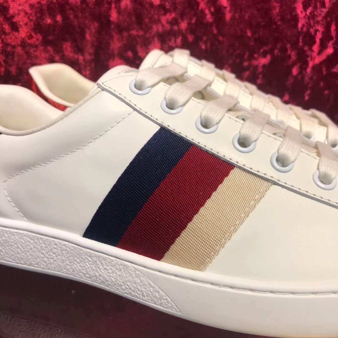 Zapatillas deportivas blancas con barras de colores - FashionHype.xyz