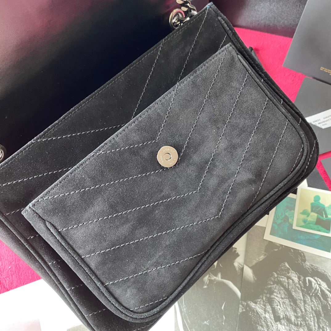Schwarze Taschen