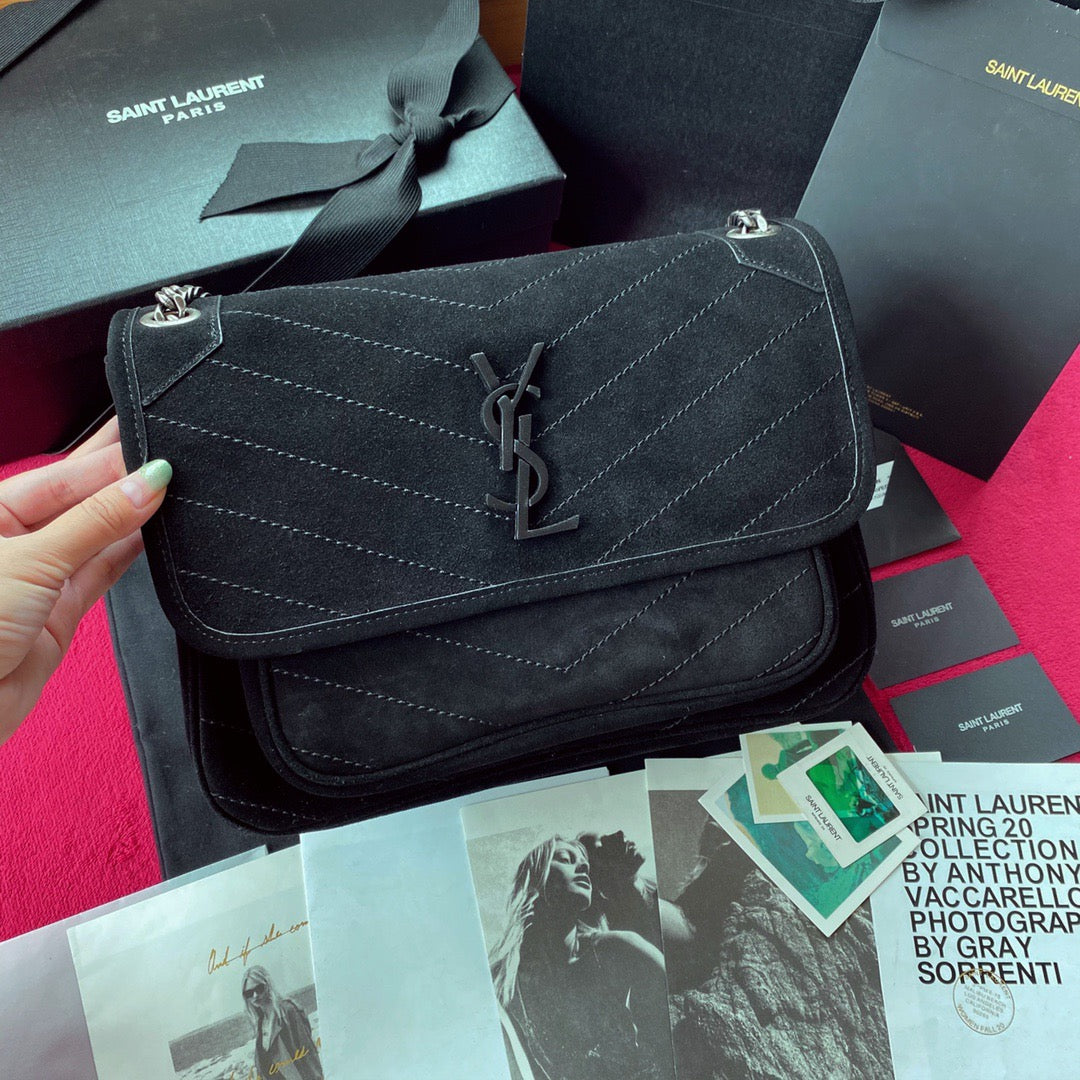 Schwarze Taschen