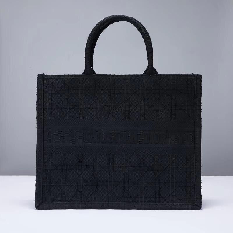 Schwarze, graue und pfirsichfarbene Taschen