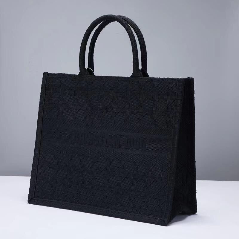 Schwarze, graue und pfirsichfarbene Taschen