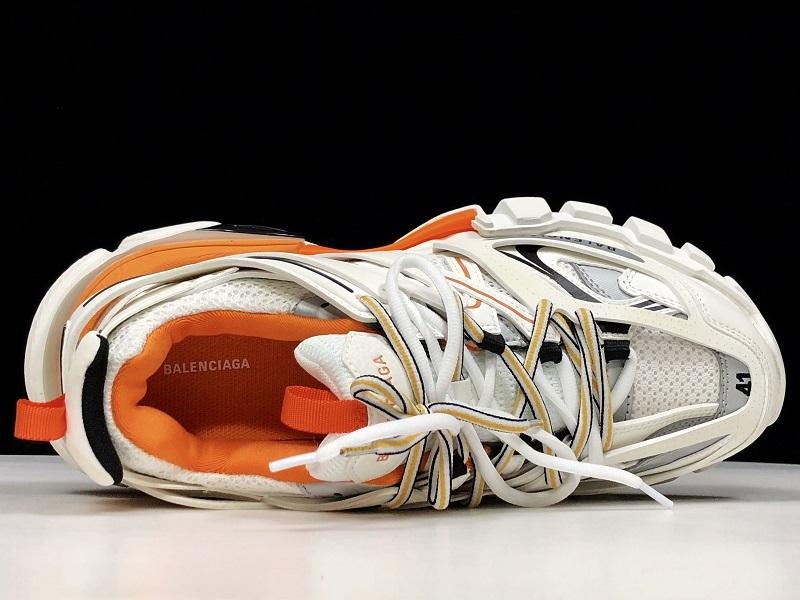 حذاء رياضي أبيض/برتقالي