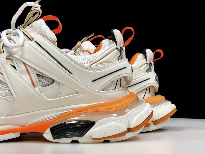 حذاء رياضي أبيض/برتقالي